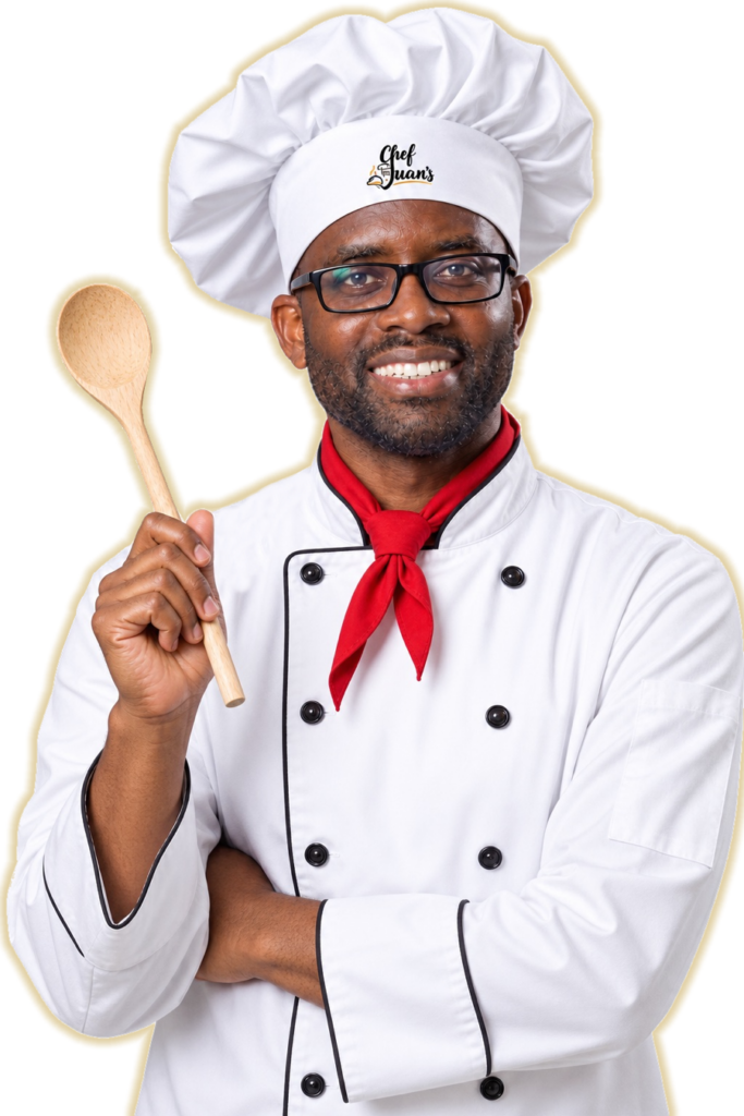 Chef Juan T. McAllister holding a wooden spoon, Chef Juans Food-Business Consulting